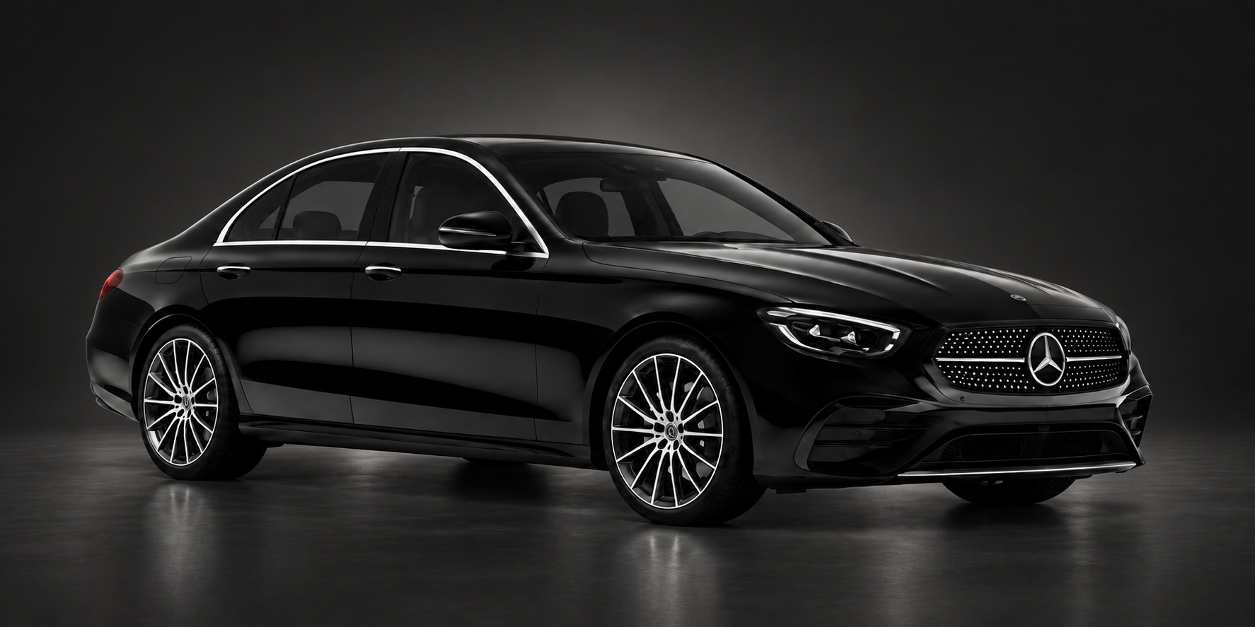 Black Mercedes E-Class sedan